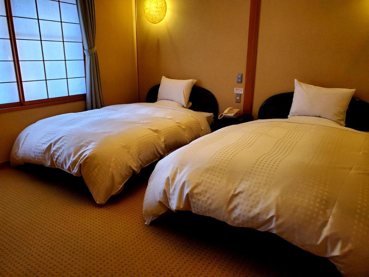 Ryotei Tanokura Hotel Юфу Екстериор снимка