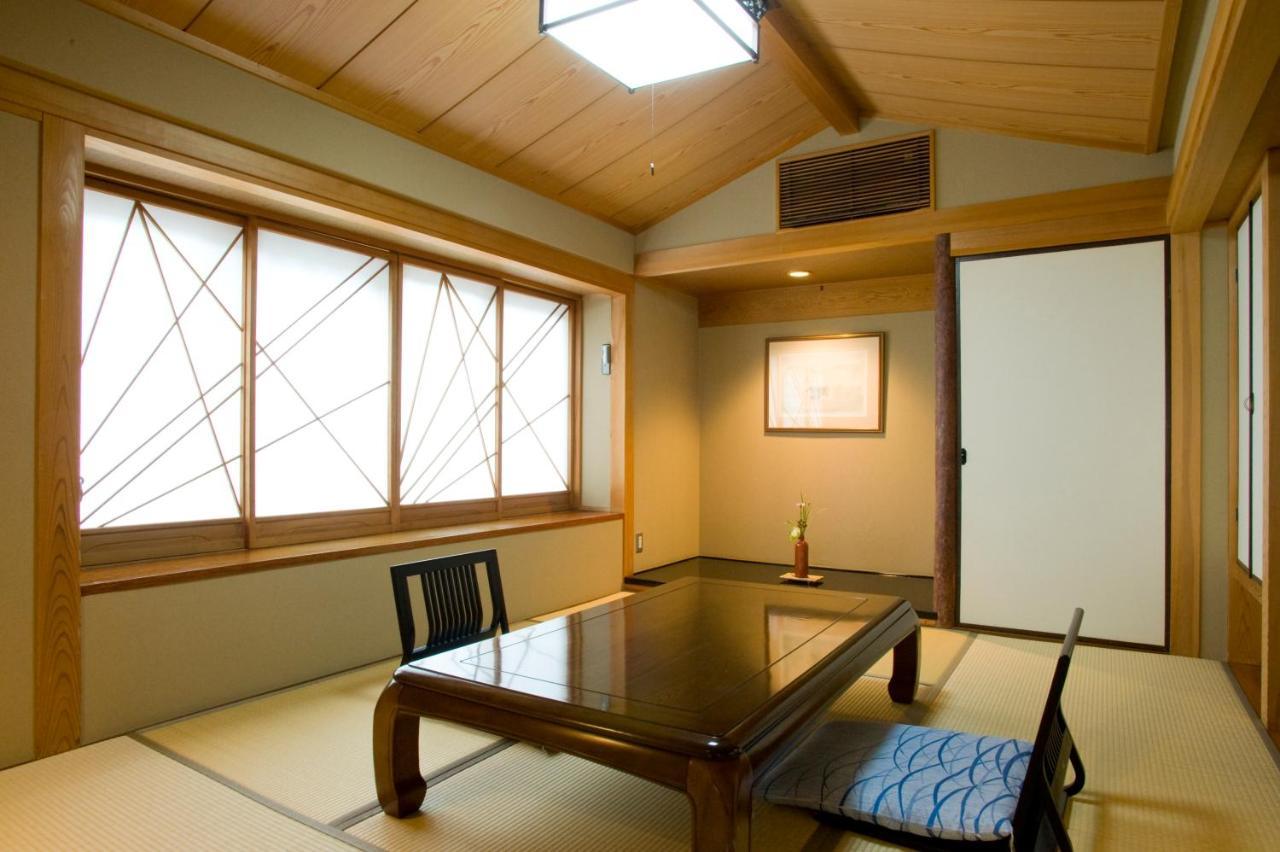 Ryotei Tanokura Hotel Юфу Екстериор снимка