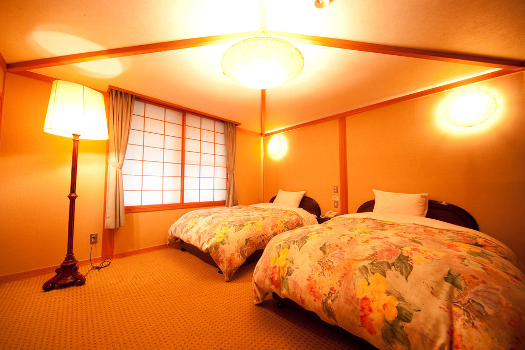 Ryotei Tanokura Hotel Юфу Екстериор снимка