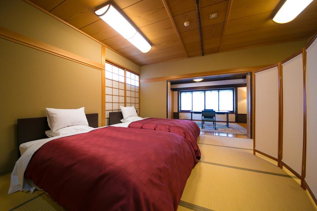 Ryotei Tanokura Hotel Юфу Екстериор снимка