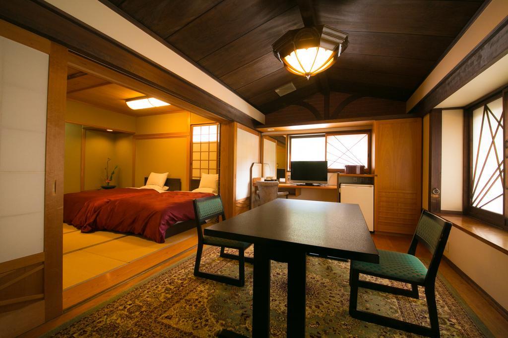 Ryotei Tanokura Hotel Юфу Екстериор снимка