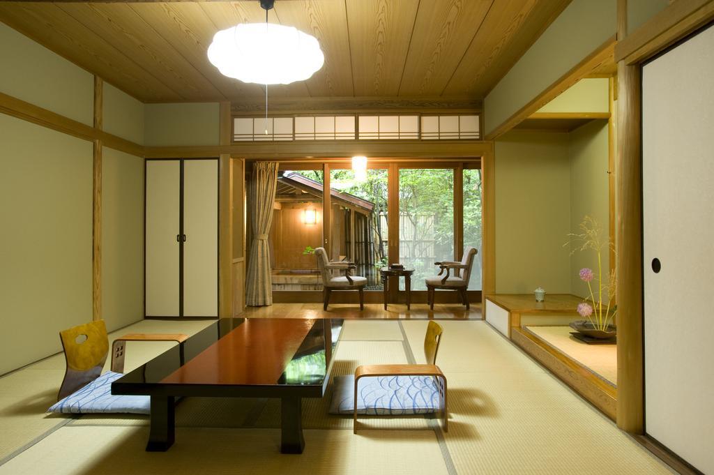 Ryotei Tanokura Hotel Юфу Екстериор снимка
