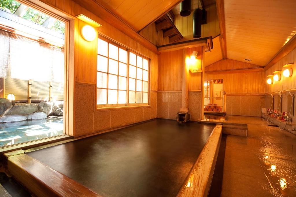 Ryotei Tanokura Hotel Юфу Екстериор снимка