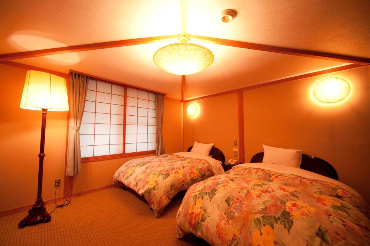 Ryotei Tanokura Hotel Юфу Екстериор снимка