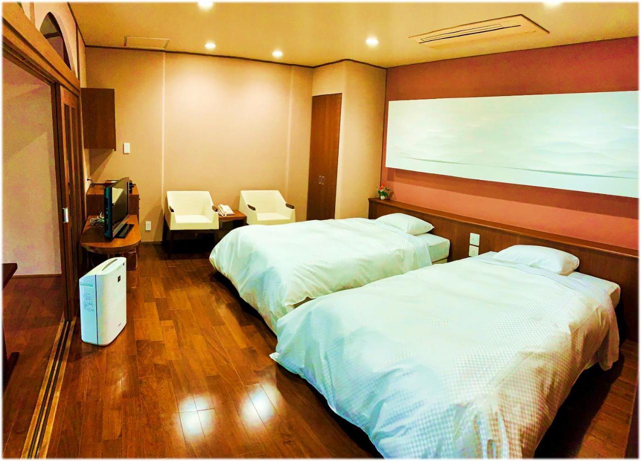 Ryotei Tanokura Hotel Юфу Екстериор снимка